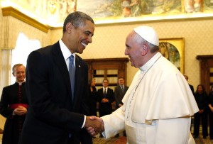 U.S. President Barack Obama shakes hands with Pope Francis (R) during their meeting at the Vatican March 27, 2014. Obama's first meeting on Thursday with Pope Francis was expected to focus on the fight against poverty and skirt moral controversies over abortion and gay rights.